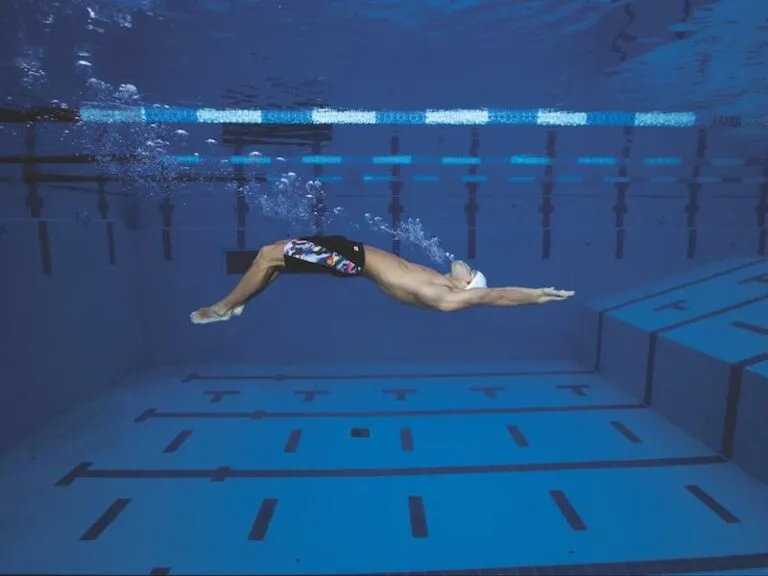 Your Turns Are Costing You Seconds: The Physics Behind a Race-Winning Flip